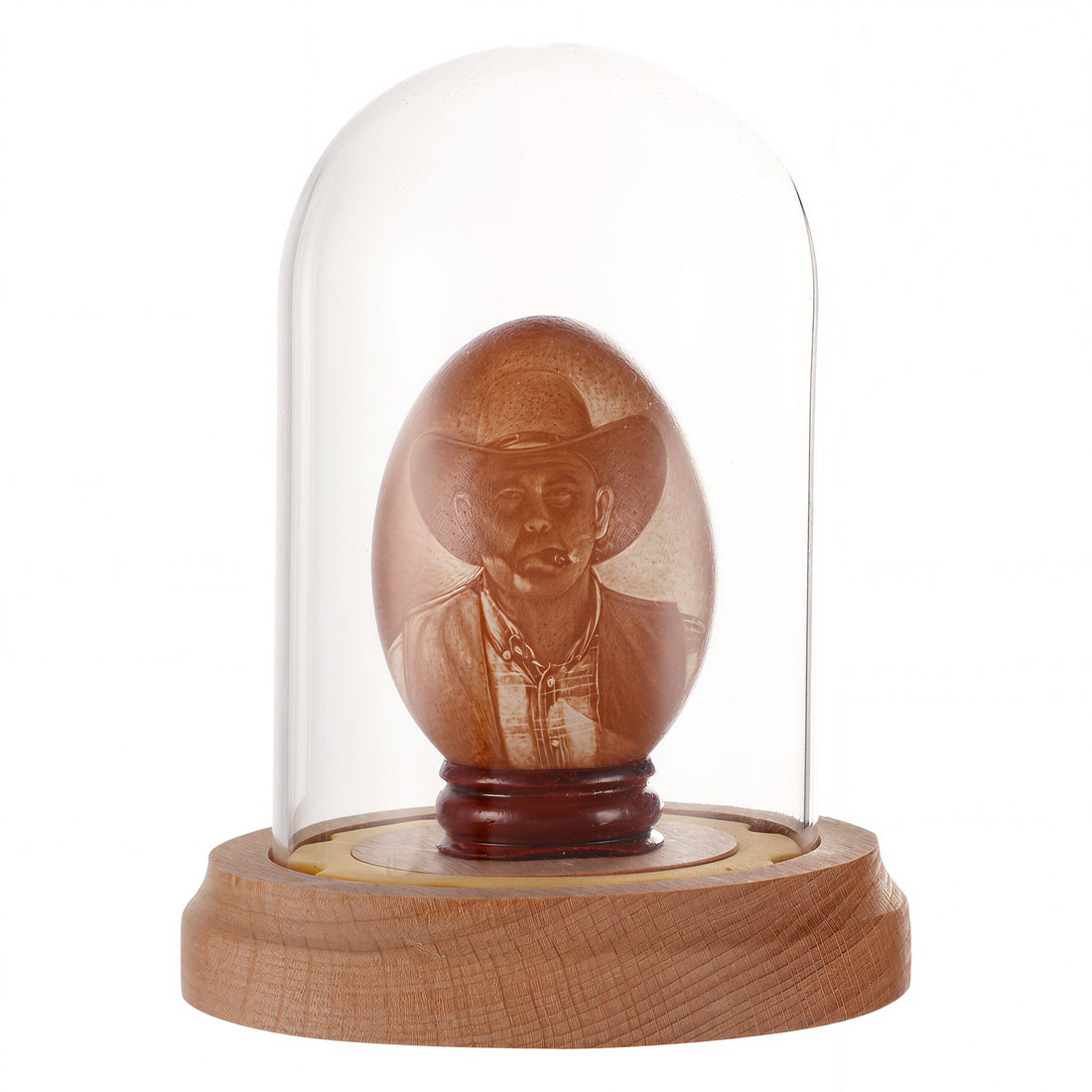 Custom hand-carved eggshell portrait illuminated with warm internal LED light